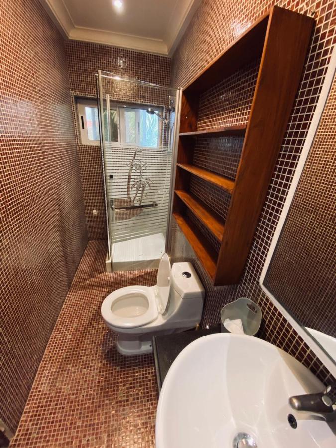 L'Oasis Guesthouse Cotonou Esterno foto
