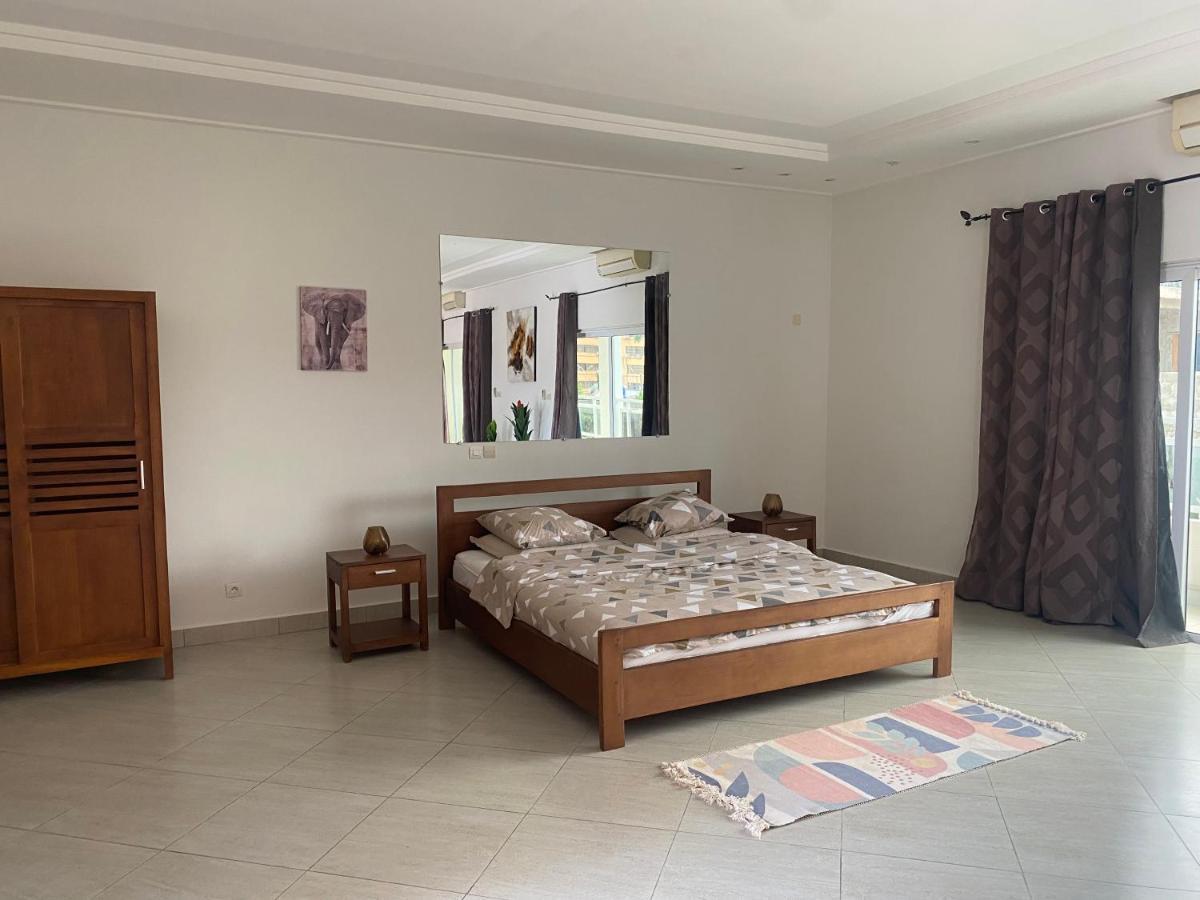 L'Oasis Guesthouse Cotonou Esterno foto