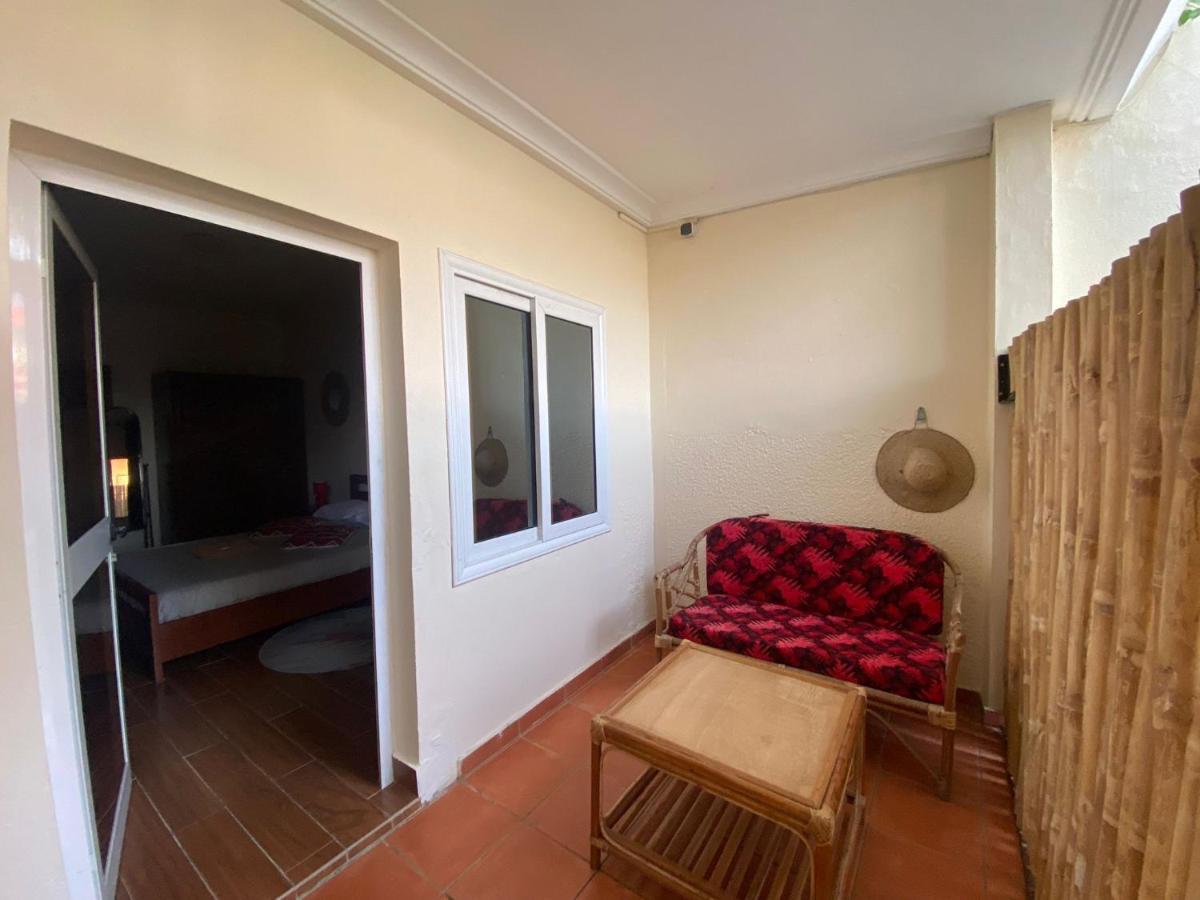 L'Oasis Guesthouse Cotonou Esterno foto