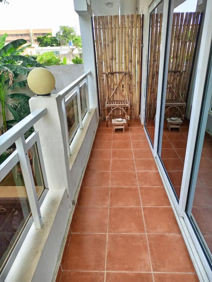 L'Oasis Guesthouse Cotonou Esterno foto
