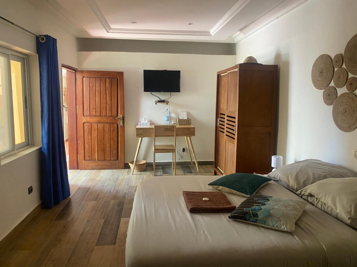 L'Oasis Guesthouse Cotonou Esterno foto