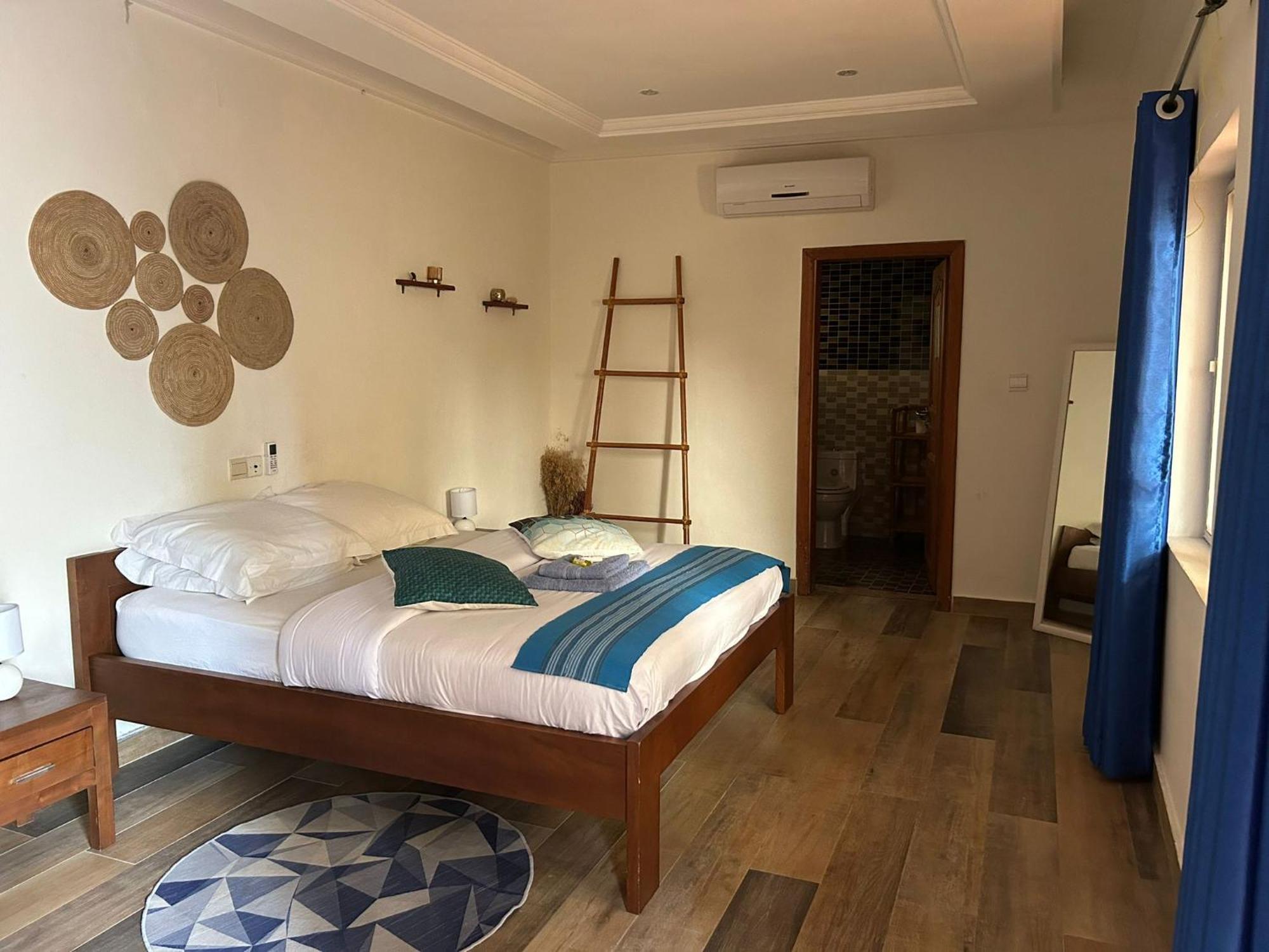 L'Oasis Guesthouse Cotonou Esterno foto
