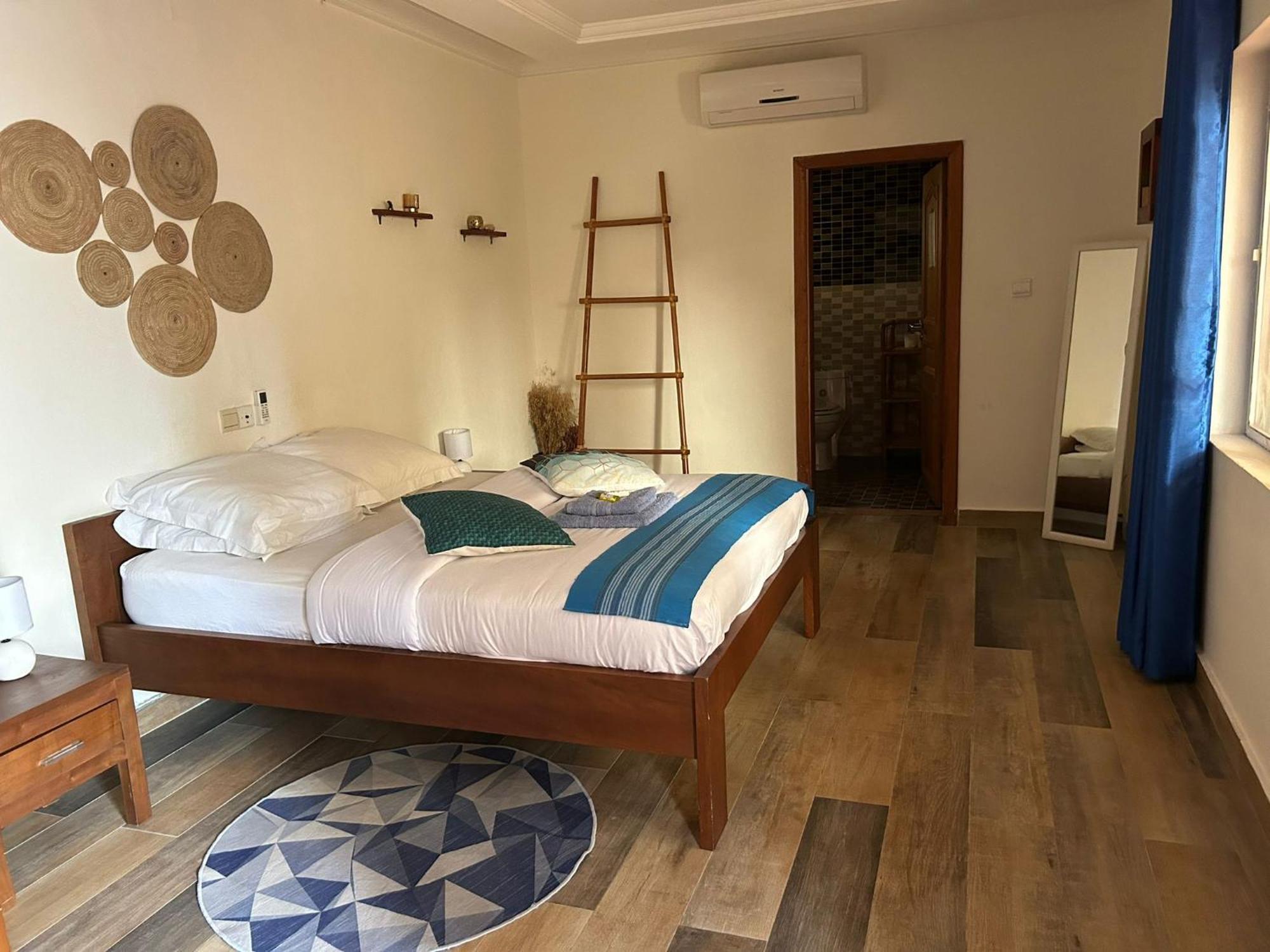 L'Oasis Guesthouse Cotonou Esterno foto
