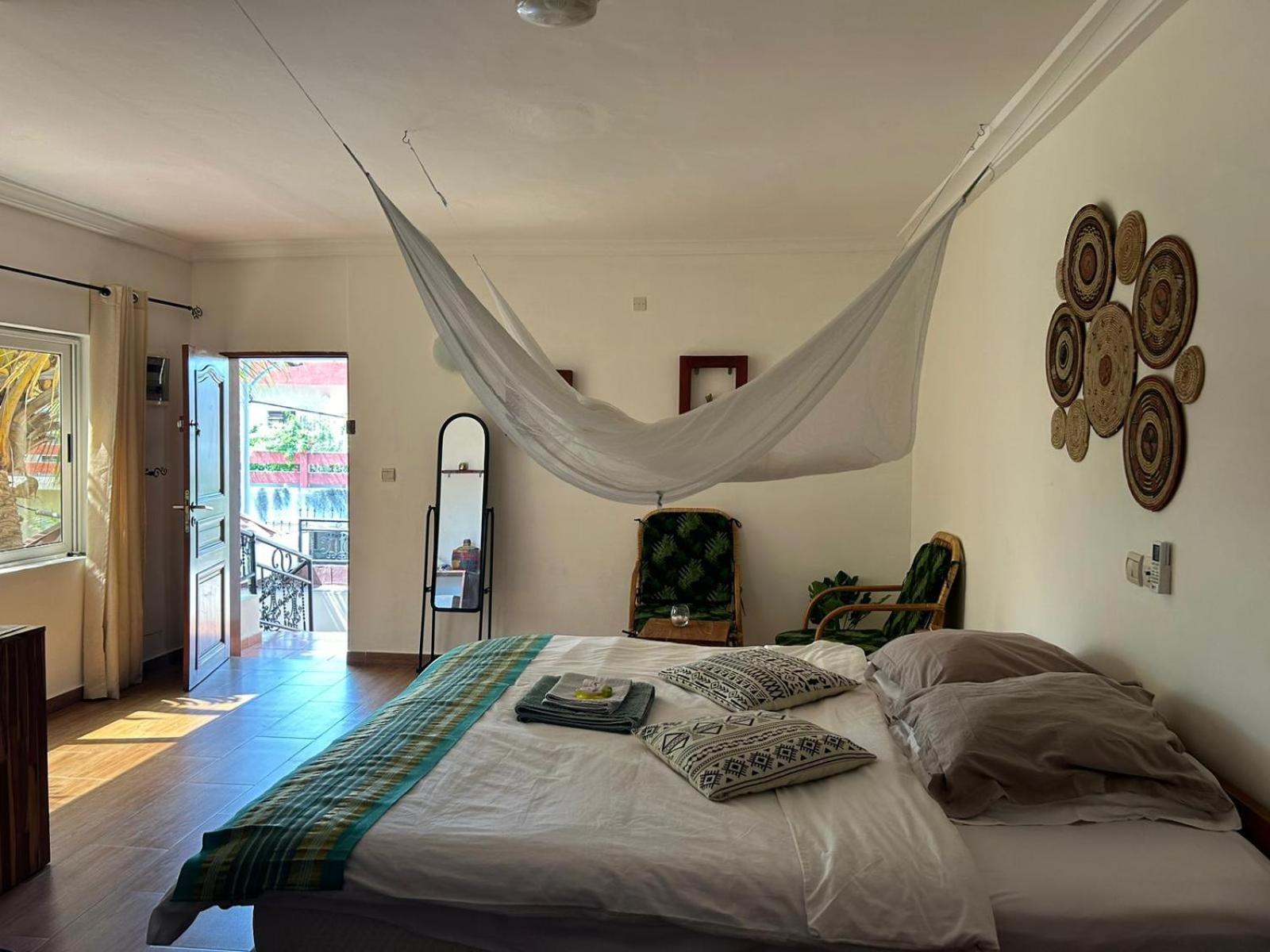 L'Oasis Guesthouse Cotonou Esterno foto
