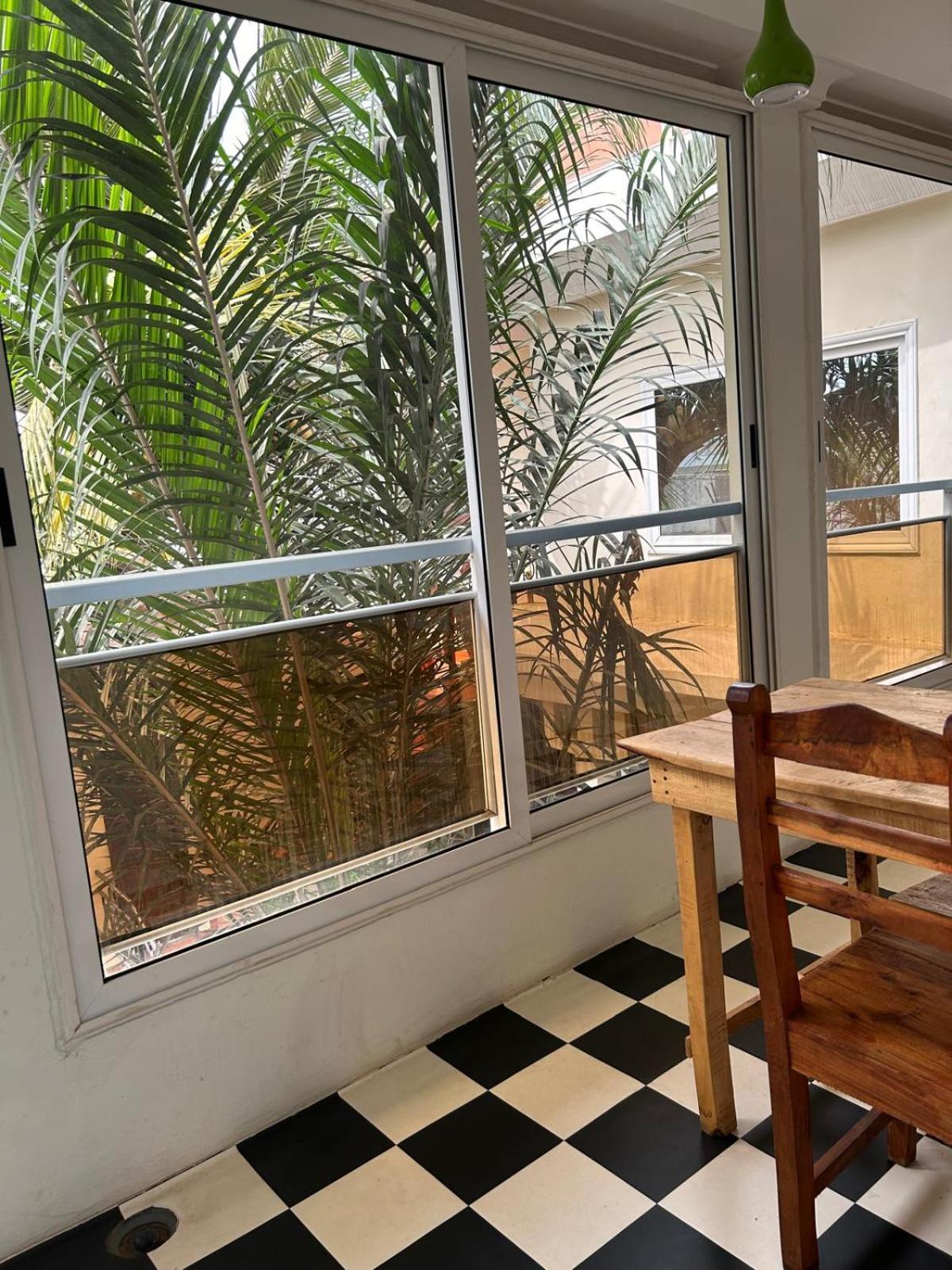 L'Oasis Guesthouse Cotonou Esterno foto
