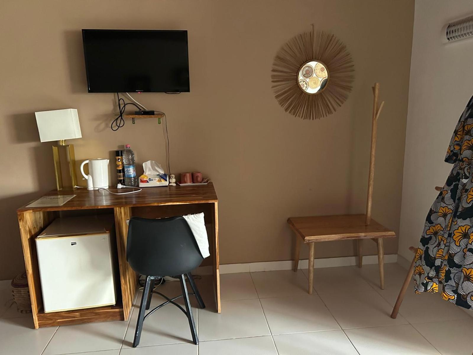 L'Oasis Guesthouse Cotonou Esterno foto
