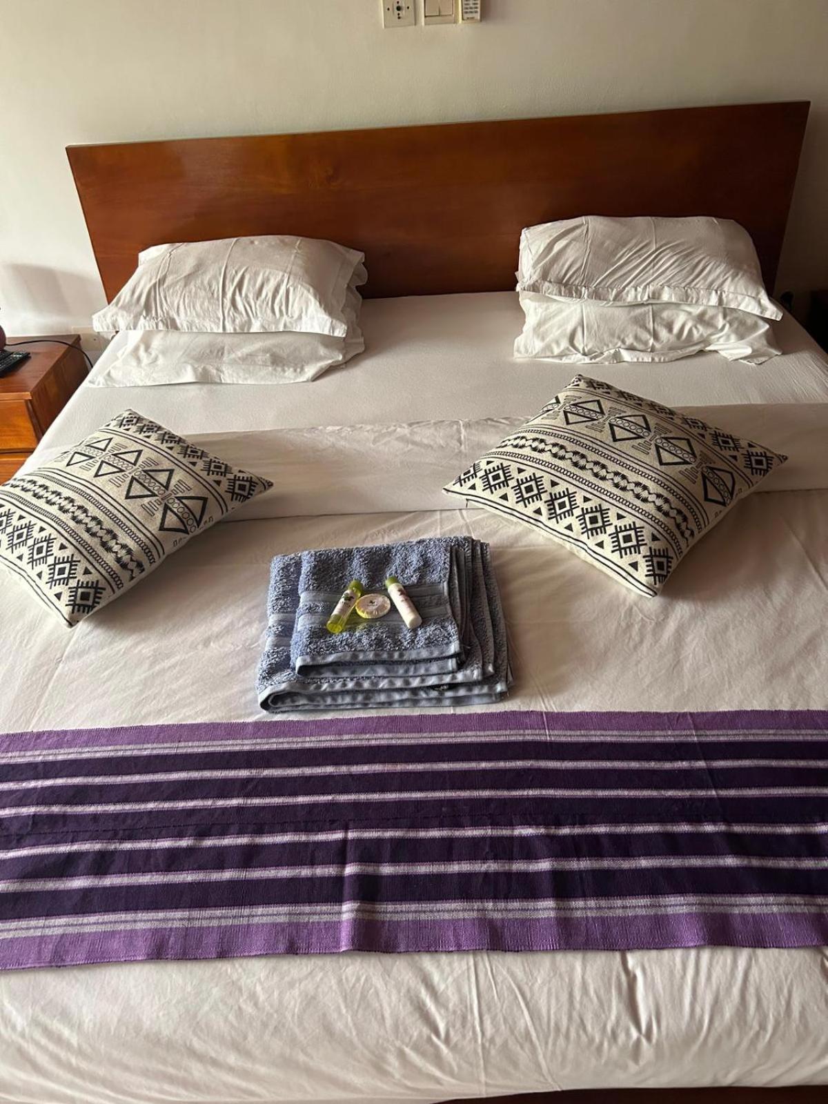 L'Oasis Guesthouse Cotonou Esterno foto